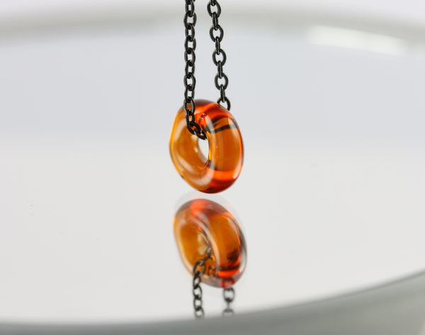 Circle Kette Orange Klapperglas